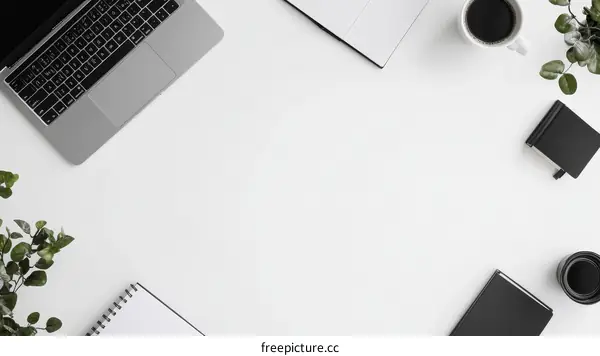 Simple Workspace with Laptop and Stationery