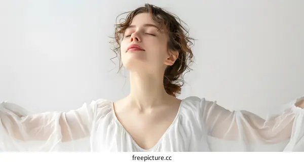 Woman in White Dress with Closed Eyes