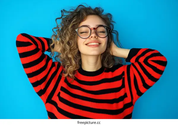 Relaxing Woman in a Red and Black Striped Sweater
