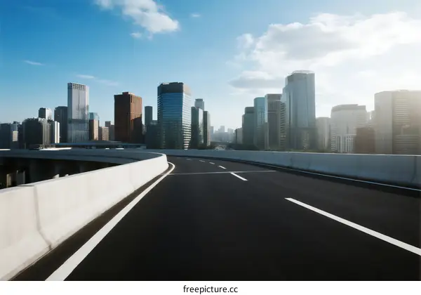Urban highway with modern city skyline in the background