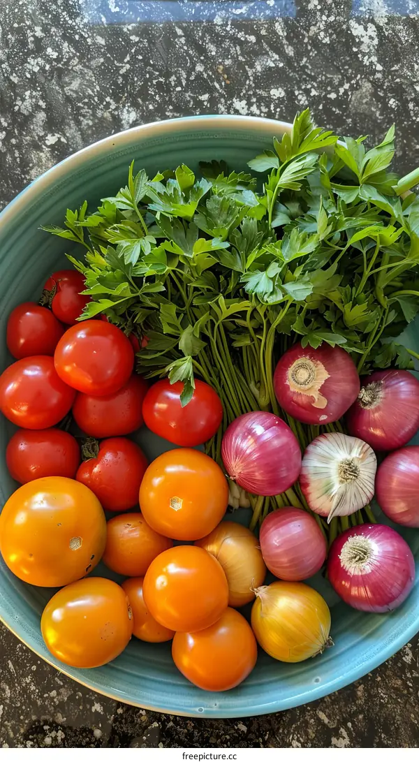 A bowl of tomatoes, shallots and parsley