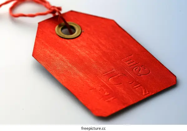 Red price tag with string