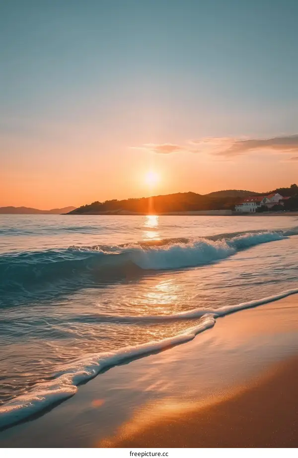 Beach sunset with house on the hill