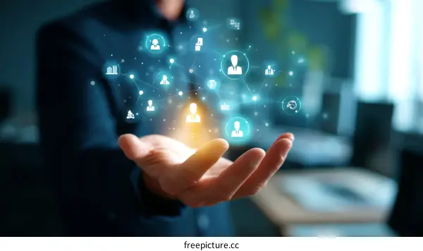 Human Hand Displaying Digital Network Connections with Icons