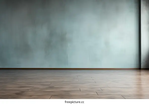 Blue grunge wall and brown wooden floor