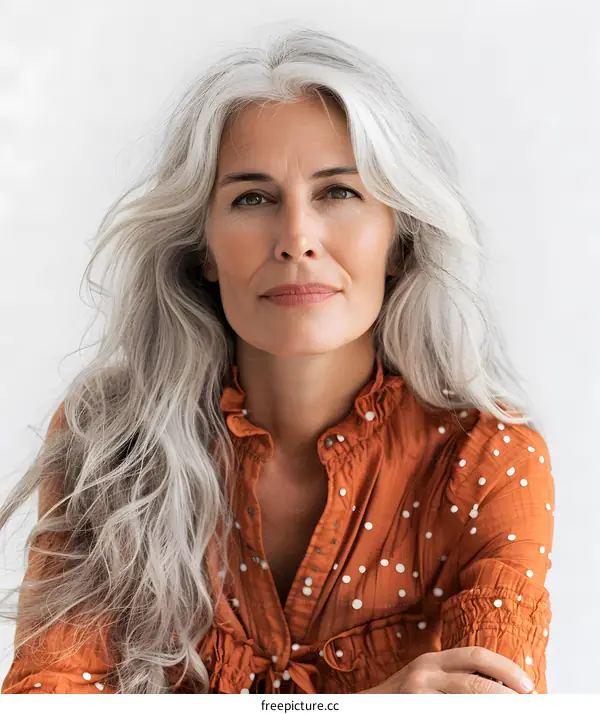 portrait of a beautiful mature woman with long white hair