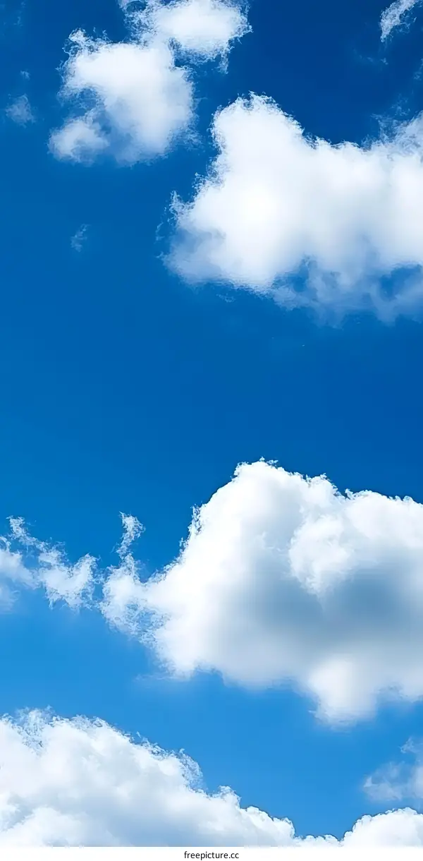 White Fluffy Clouds in a Blue Sky