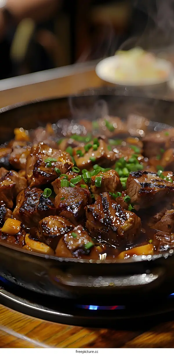 Close Up of Steaming Beef Slices in A Hot Pot