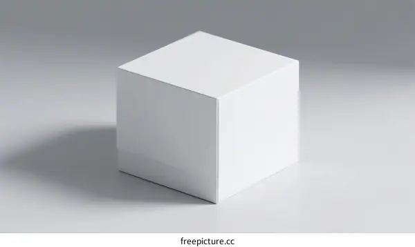 A Simple White Cube on a Plain Gray Background