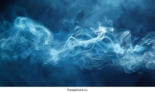 Blue smoke swirls gracefully against a dark background