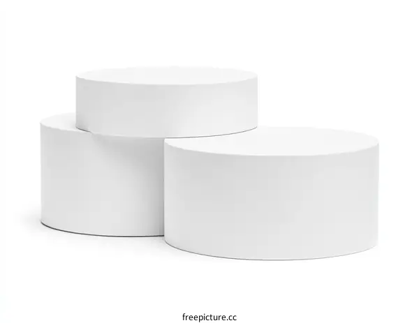 Three White Cylindrical Display Stages