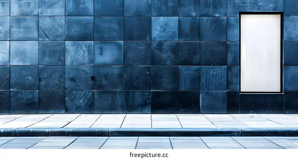 Blue Tile Wall With Window and Sidewalk