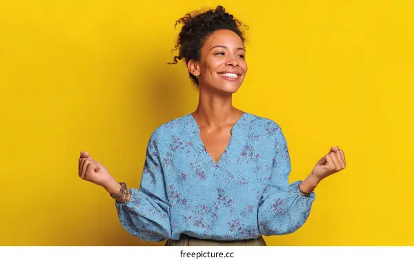 Happy African American Woman Posing Against Yellow Background