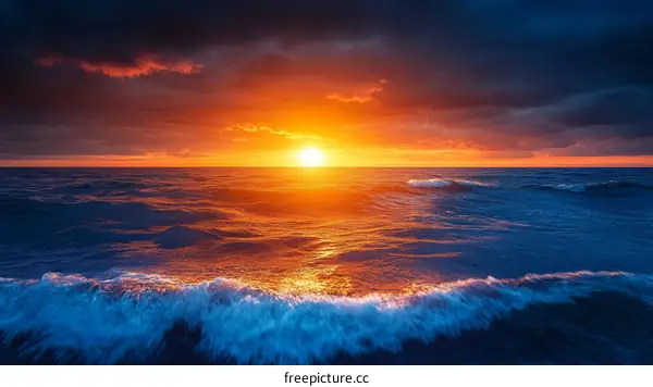 Sunset over the Ocean Waves of Golden Hues