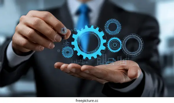 Businessman Presenting Digital Gears