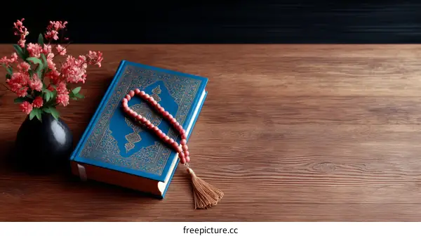 Holy Quran Book and Prayer Beads on Wooden Table