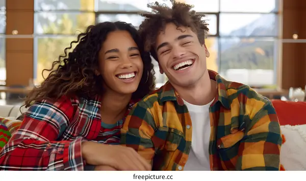 Happy Interracial Couple Smiling Together in a Plaid Shirt