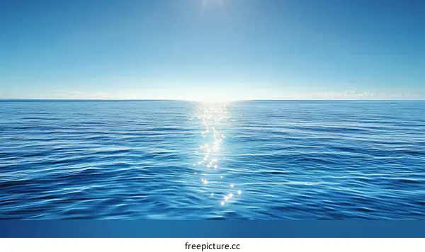 Calm blue ocean with bright shining sun above