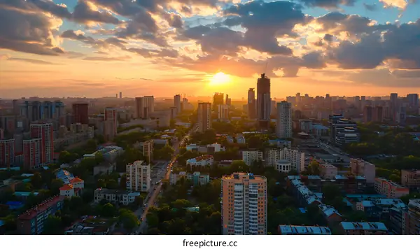 Aerial View of Cityscape with Sunset Clouds