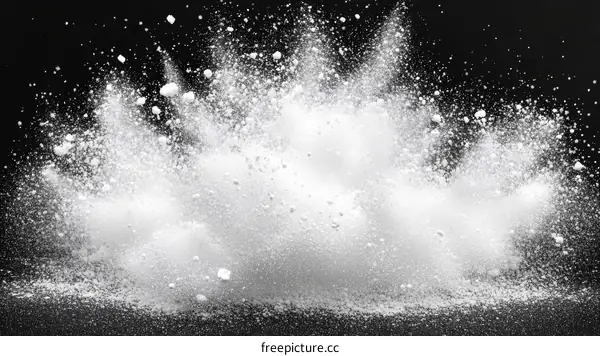White Powder Explosion on Black Background