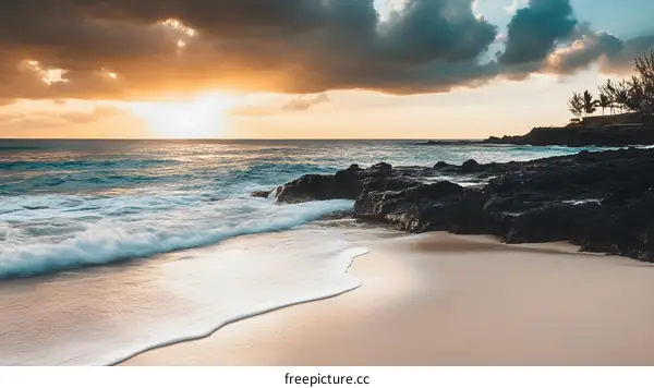 Sunset Over The Ocean With Rocky Coastline And Sandy Beach