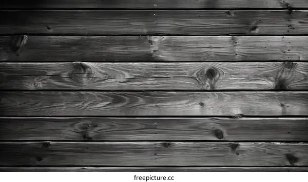 Black wooden fence planks background texture