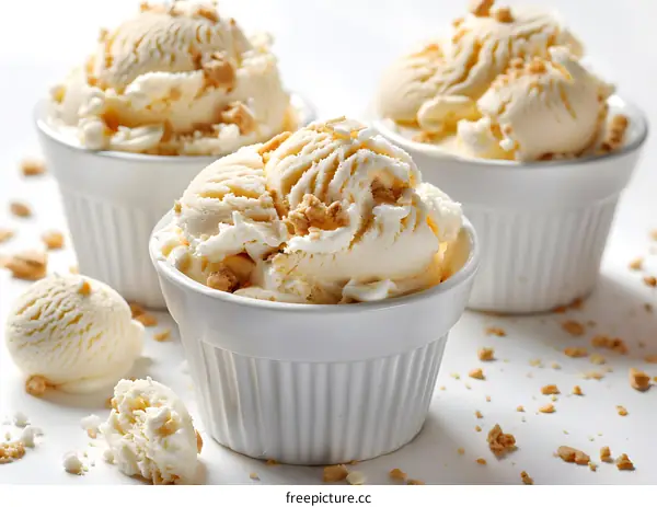 Three ice cream in white bowls