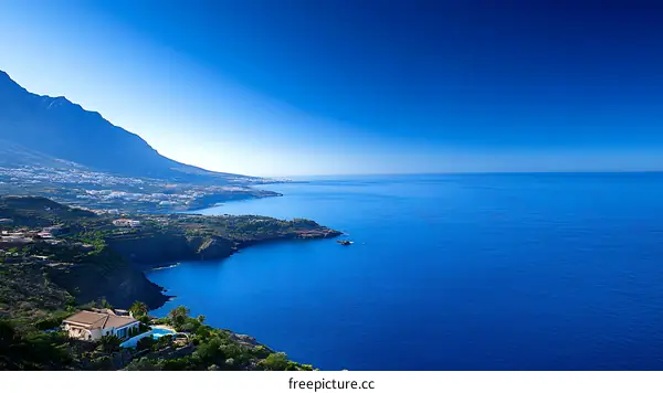 Coastal Landscape with Mountains and Blue Ocean