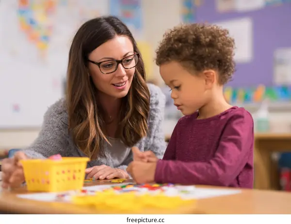 Teacher and Child Engaging in Educational Activity