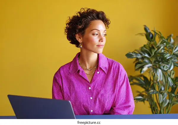 Woman Working from Home in a Stylish Purple Shirt