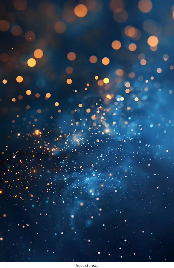 Blue abstract background with golden bokeh lights