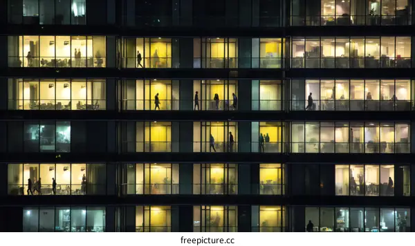 Night Workers in a Modern Skyscraper