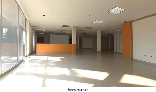Empty Office Space With Large Windows