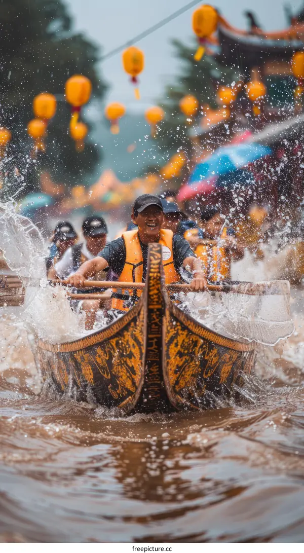 A group of people rowing a boat in a river during a festival