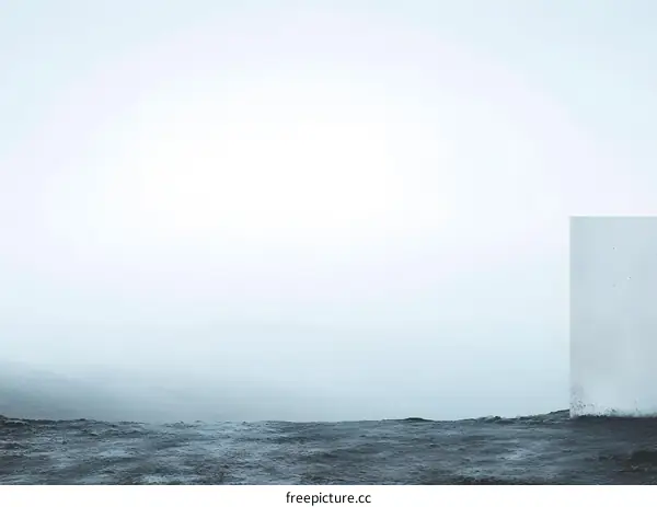 Minimalist Concrete Structure in Foggy Landscape