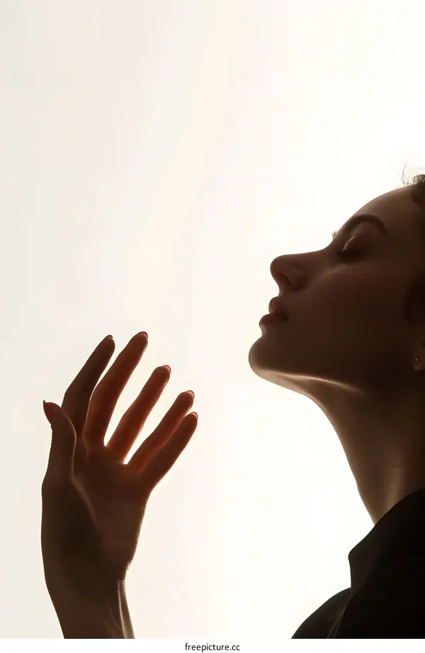 portrait of a woman in profile with dark hair