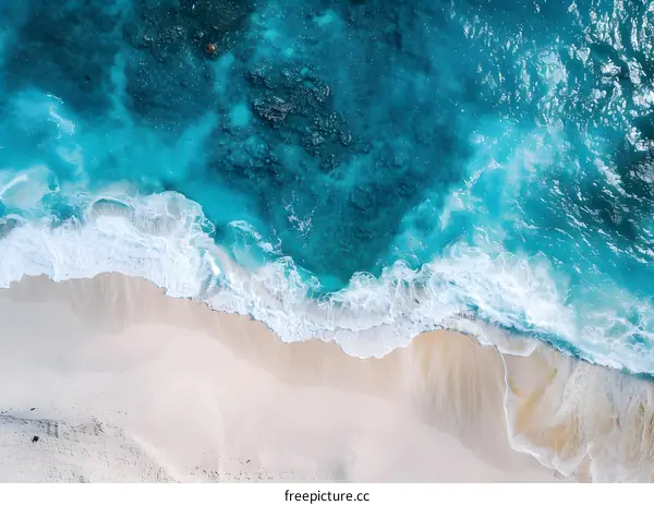 Aerial View Of White Sand Beach And Ocean Waves