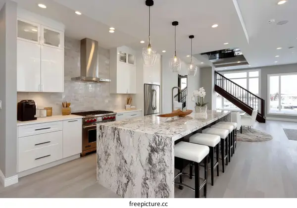 Modern Kitchen with Granite Island and Pendant Lights
