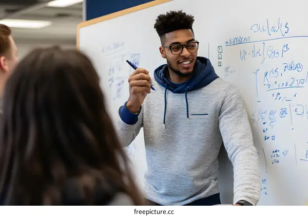 African American Man Teaching a Class About Mathematics