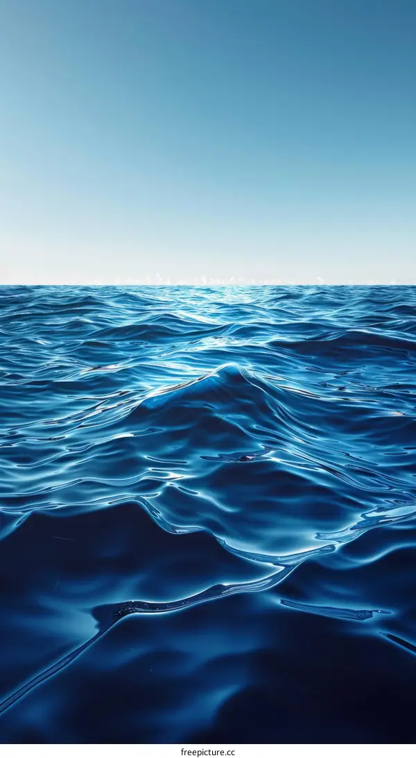 Deep Blue Ocean Water Surface with Sunlight