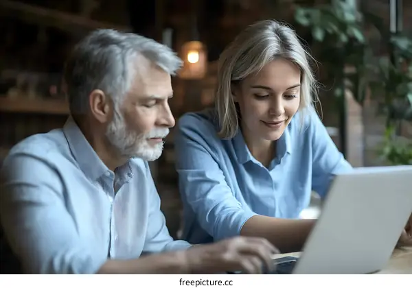 Business Collaboration at Cafe with Laptop
