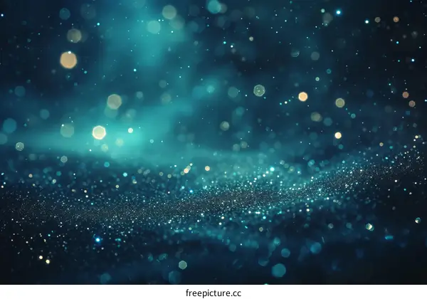 Blue glitter background with glowing particles