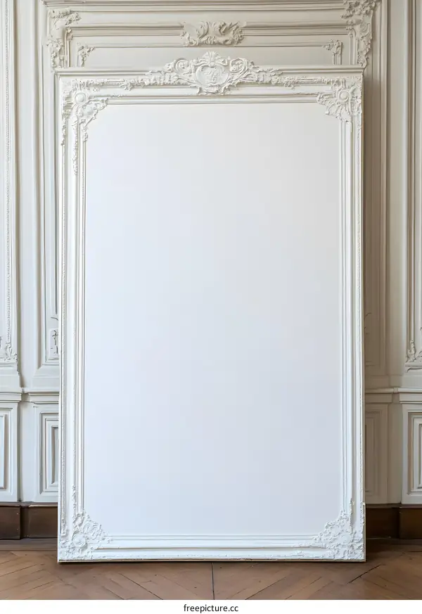White Ornate Frame on Wooden Floor