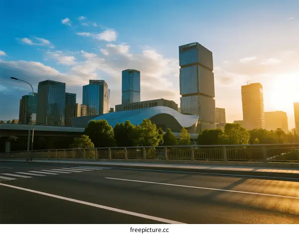 Modern city skyline with tall buildings under sunny sky