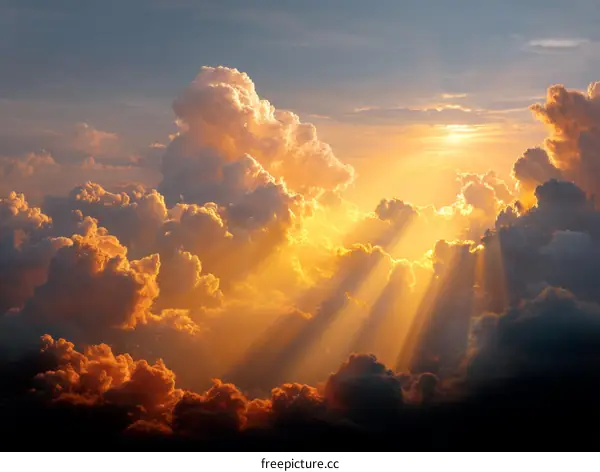 Golden Sunset Rays Through Majestic Clouds