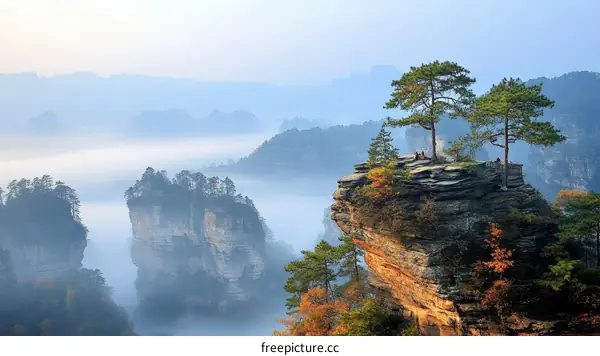 Misty Mountainscape with Isolated Rock Formation