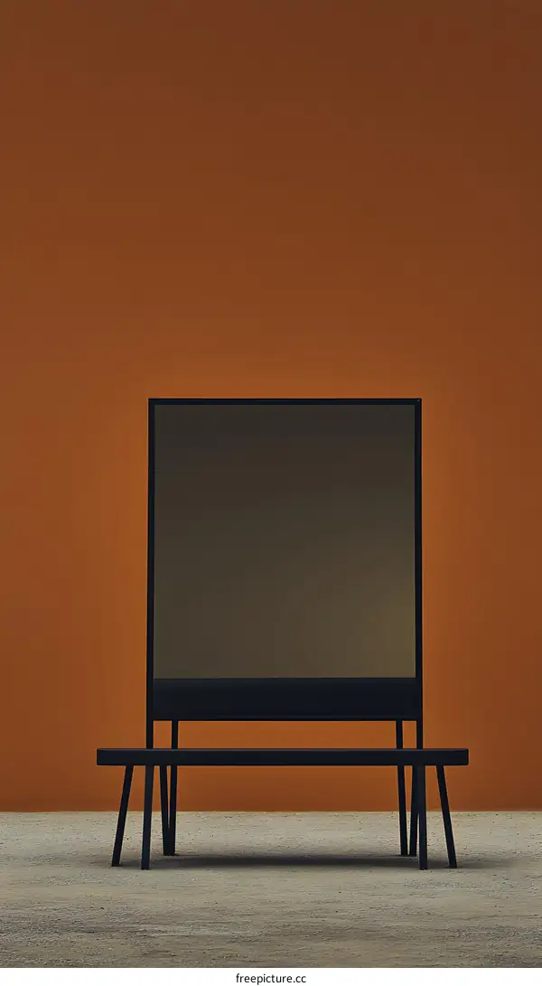 Minimalist Black Bench in Front of a Blank Canvas