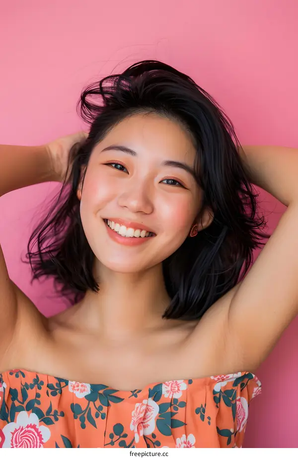 Portrait of an Asian Woman with Short Black Hair Smiling at the Camera