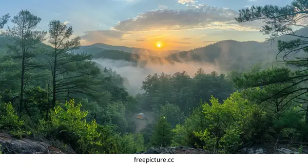 breathtaking mountain sunrise view from the top of the cliff