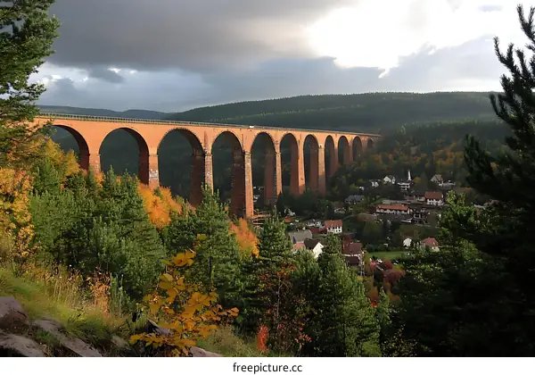 Autumnal Landscape with a Majestic Railroad Viaduct